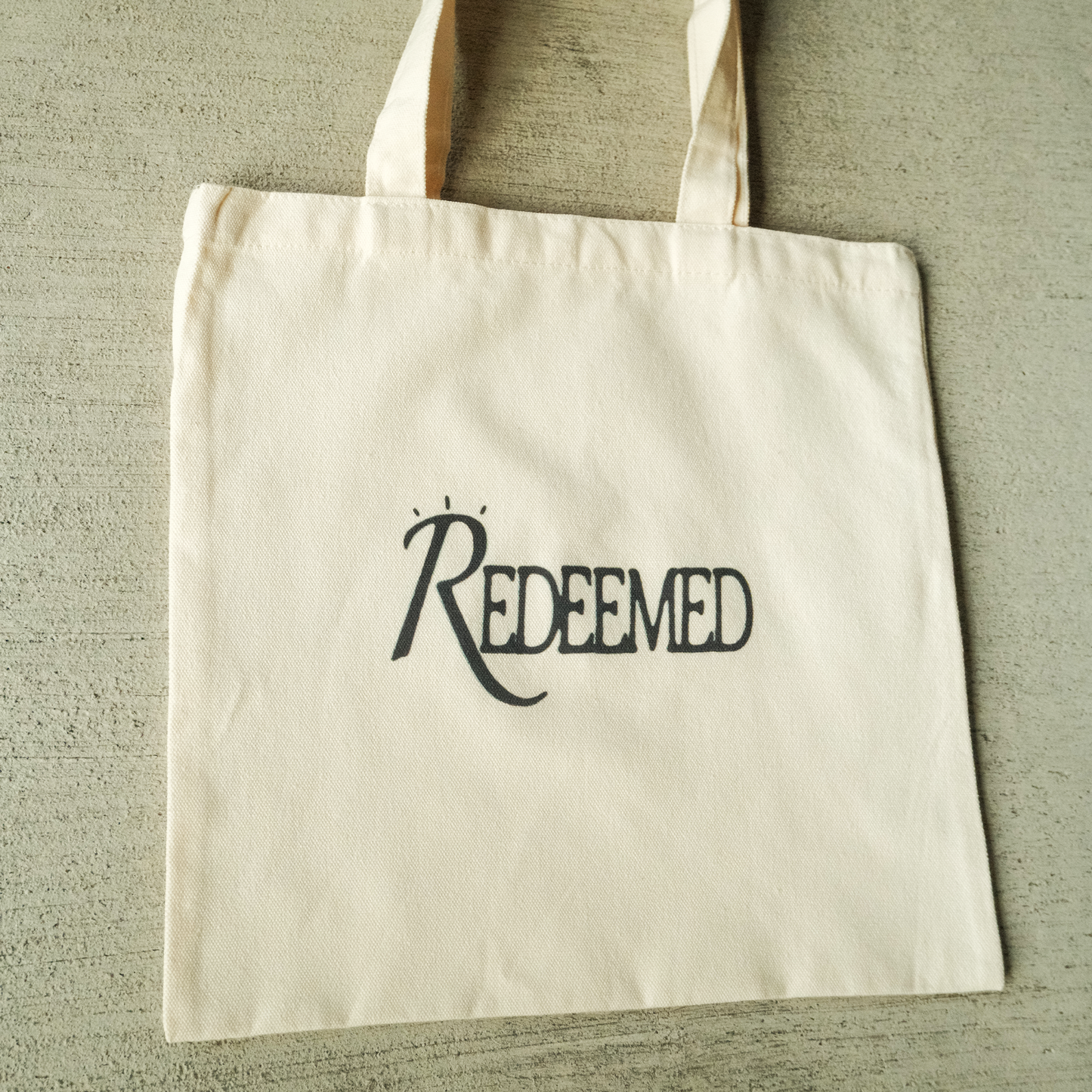 "HE HAS MORE GRACE" TOTE BAG